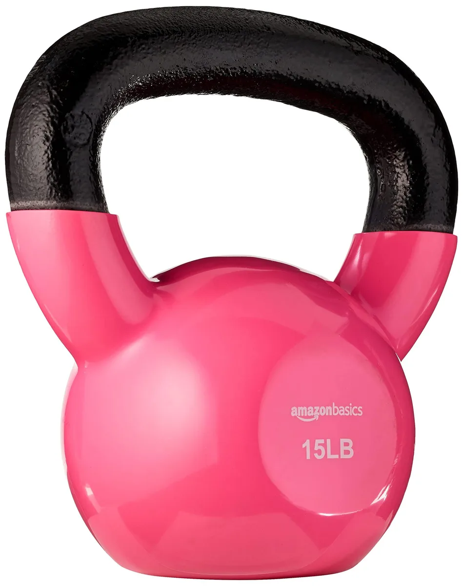 Pink vinyl-coated cast iron kettlebell, flat base, wide textured handle, 15 lb marking