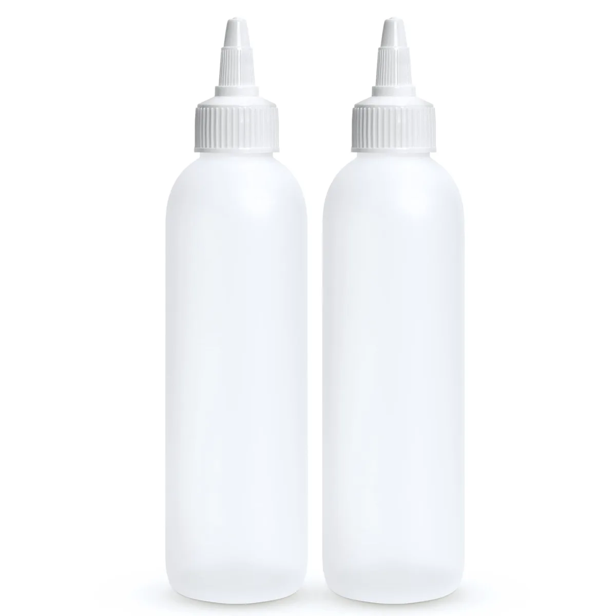Two translucent squeeze bottles with white twist caps standing side by side