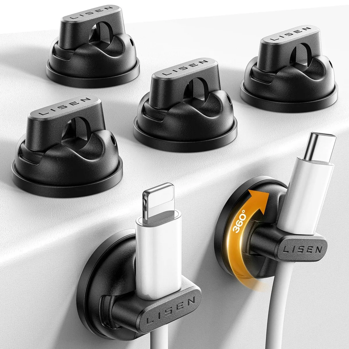 Six small black plastic cubes with magnetic tops and adhesive bases