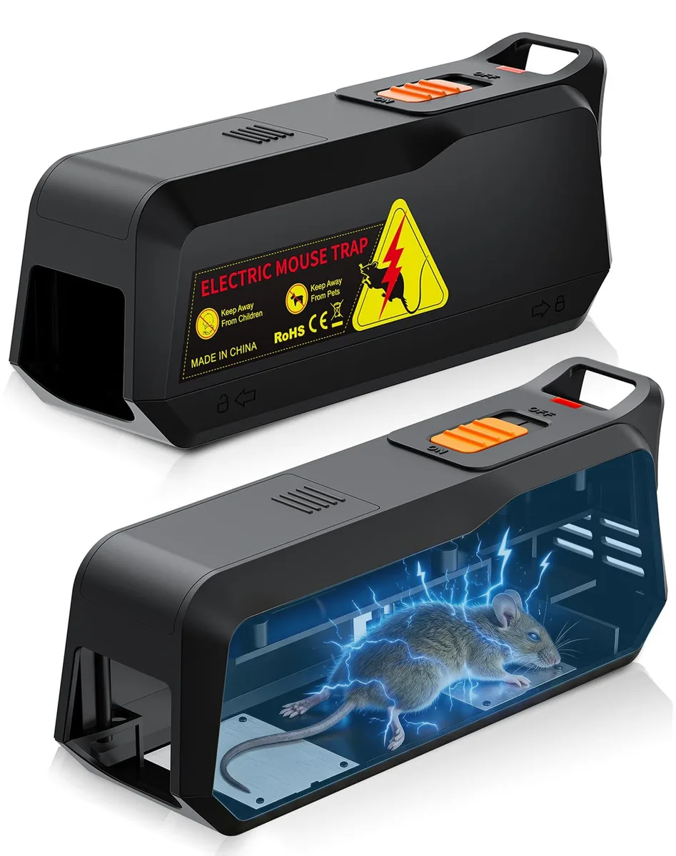 Two black rectangular plastic mouse traps side by side