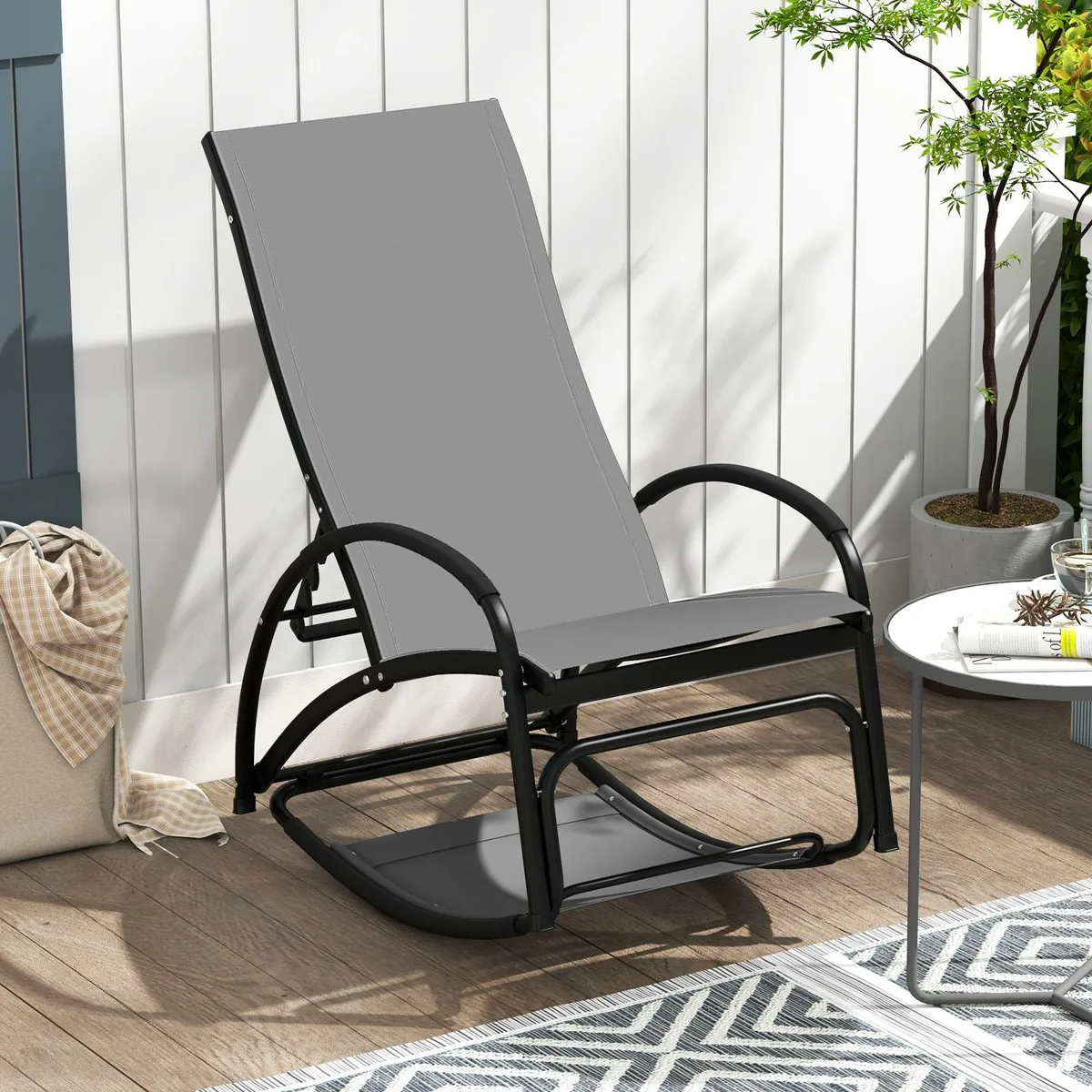 Grey aluminium rocking lounge chair with mesh seat and adjustable backrest