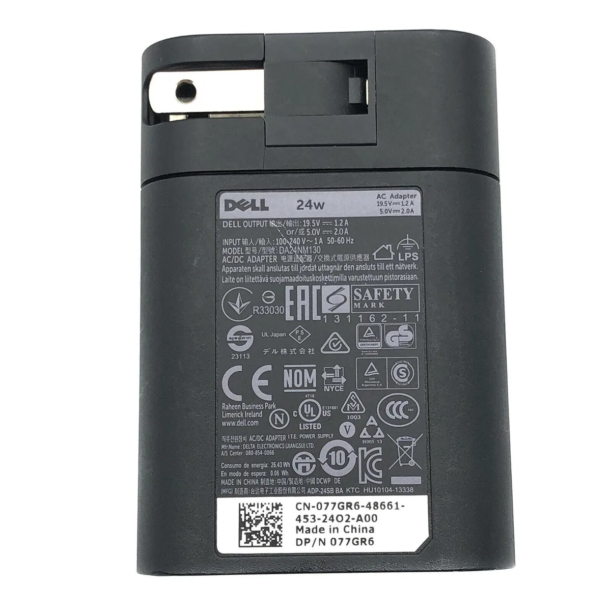 Small black rectangular power brick with attached cable