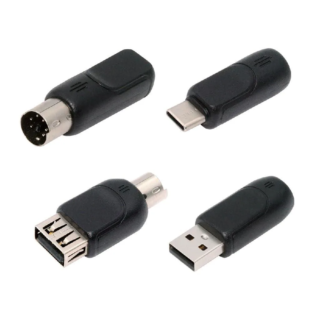Four small USB to PS/2 adapters in black plastic, two Type-A and two Type-C connectors