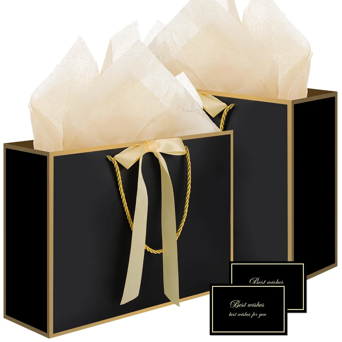 Two black gift bags with gold edges, handles, tissue paper and cards