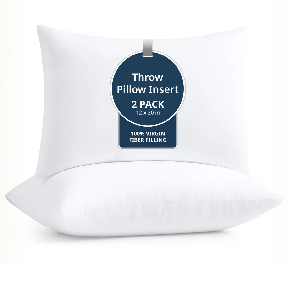 Two white rectangular pillow inserts, 12 by 20 inches, vacuum packed