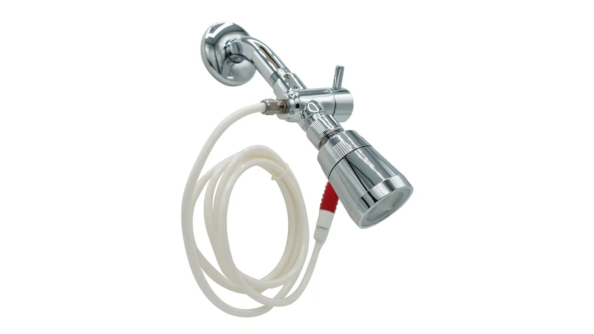 Polished chrome shower-mounted water flosser with control lever