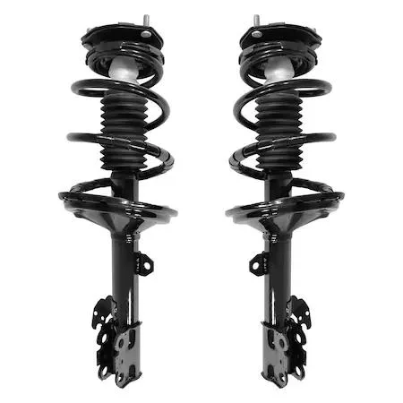 Two silver front strut assemblies with coil springs and top mounts