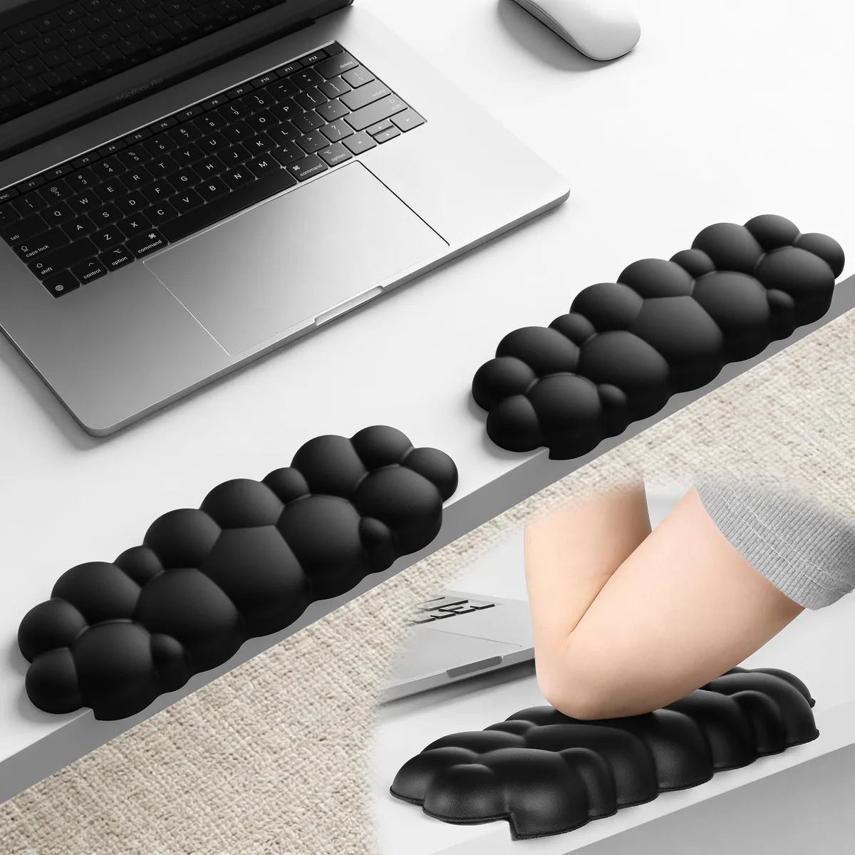 Two black L-shaped elbow rests with memory foam and faux leather finish