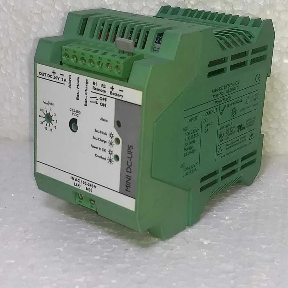 Small rectangular black DC-UPS unit with label 2866640