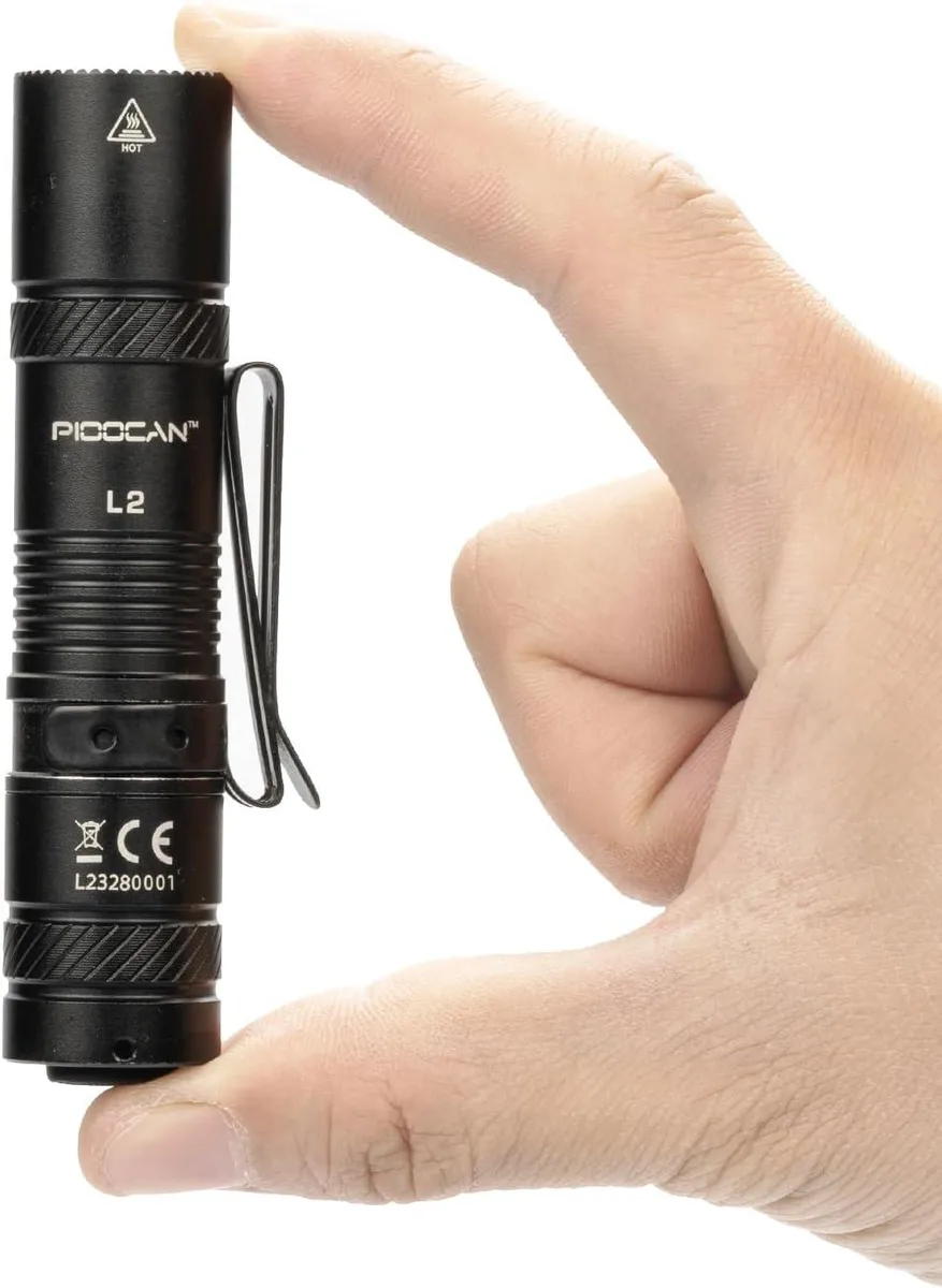 Black cylindrical flashlight with pocket clip, 3.72 inches long, matte aluminium finish