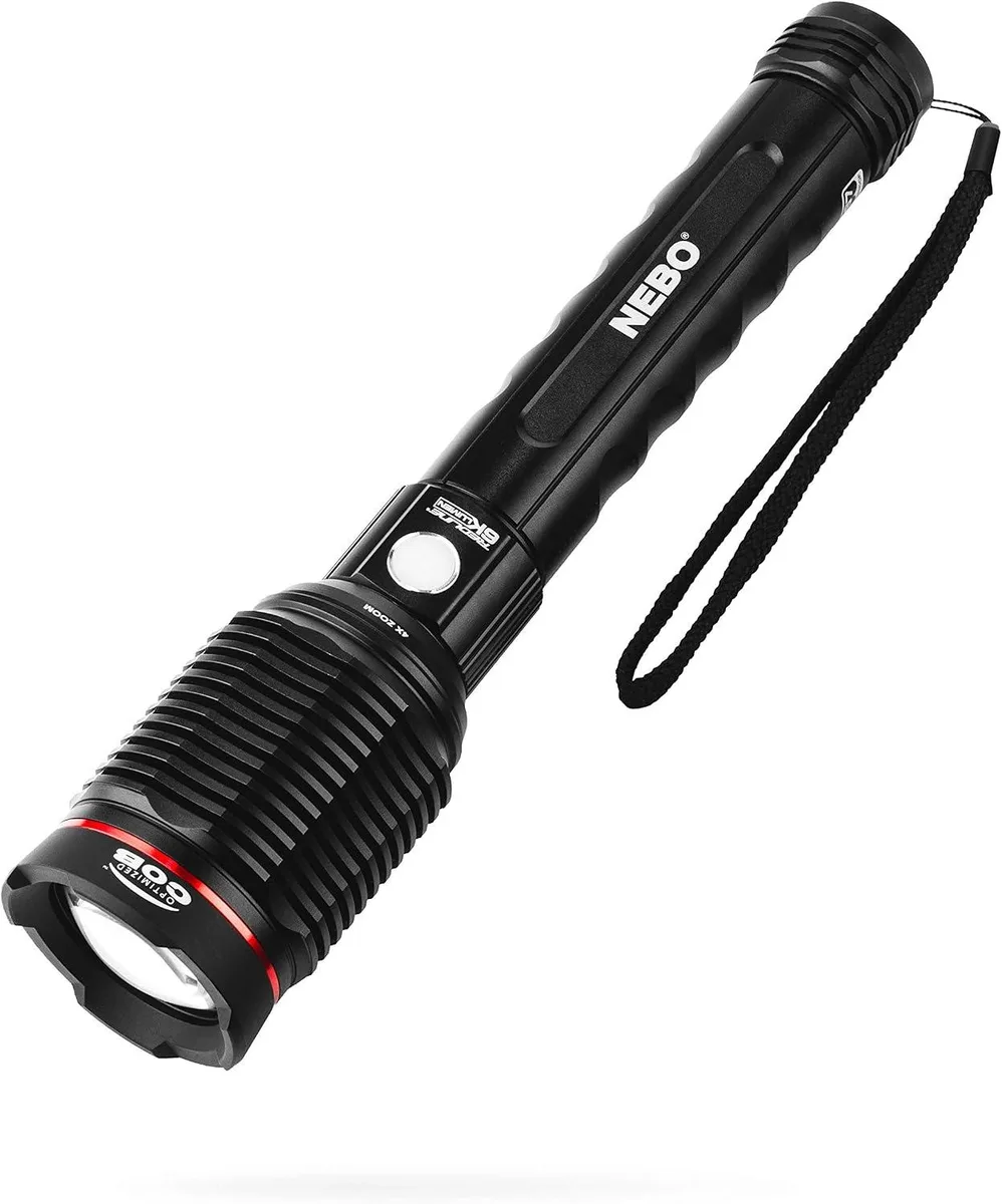 Cylindrical metal flashlight with textured grip and charging port