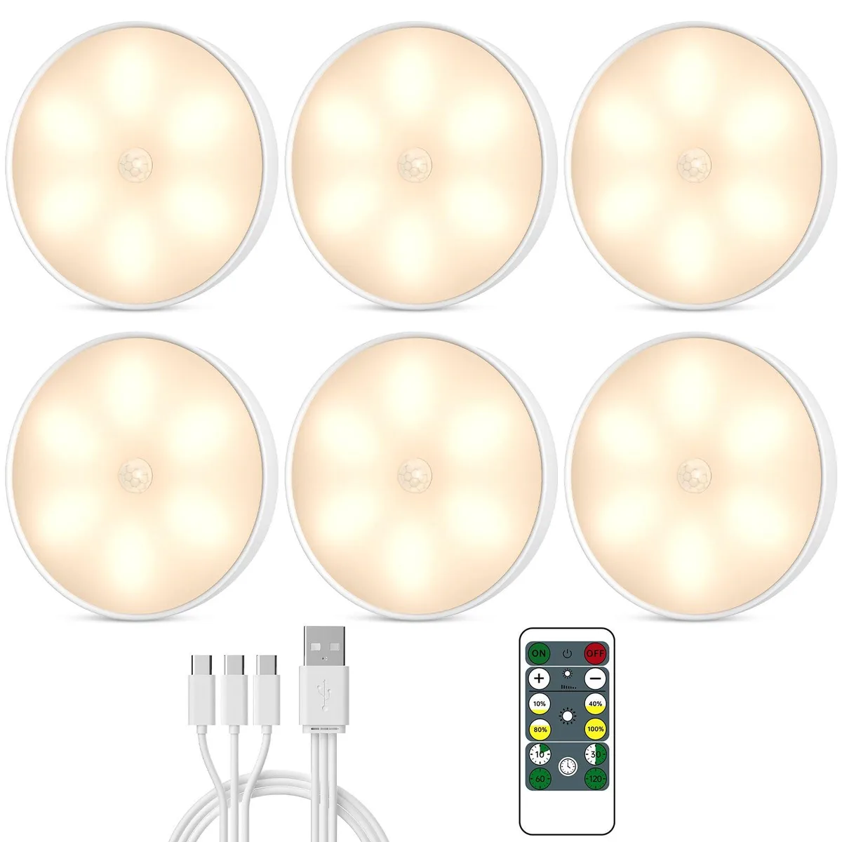 Six white puck lights with clear prismatic lenses and USB-C cables