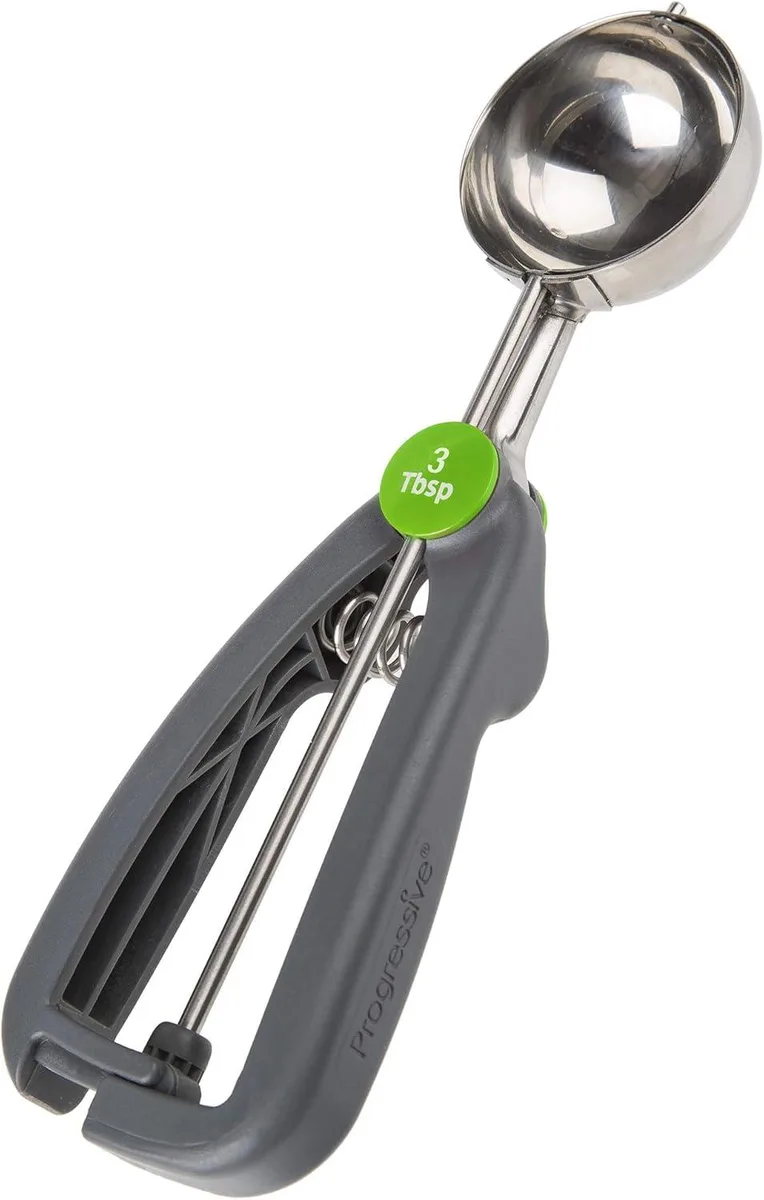 Gray metal cookie scoop with squeeze lever, 3 tablespoon capacity