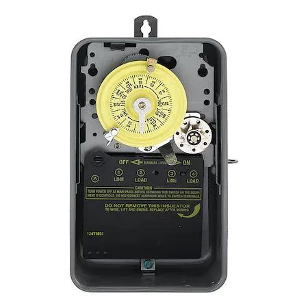 Grey metal enclosure electromechanical timer with dial and trippers