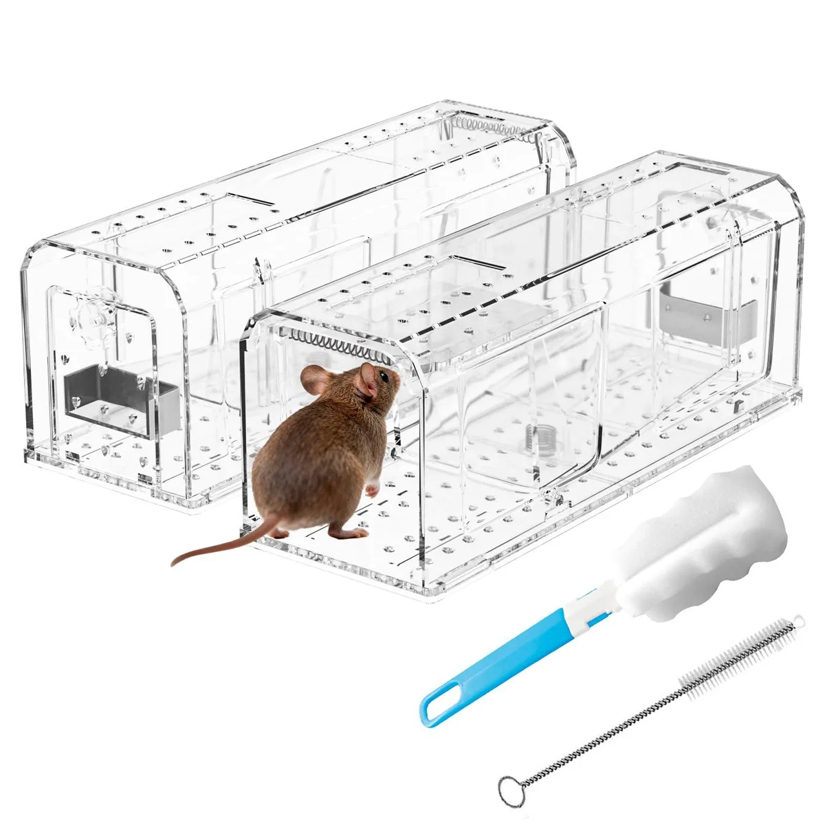 Two transparent plastic mouse traps with spring doors and a cleaning brush