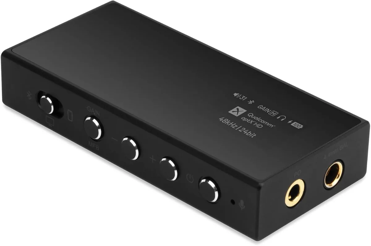 Small rectangular DAC amp with 3.5 mm and 4.4 mm jacks, volume buttons and a multifunction button, matte finish