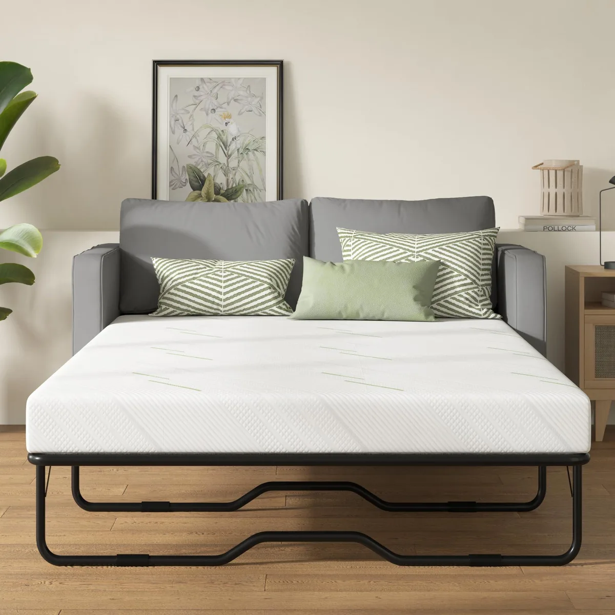 White rectangular 4 inch thick memory foam mattress folded for sofa bed use 72 by 53 inches
