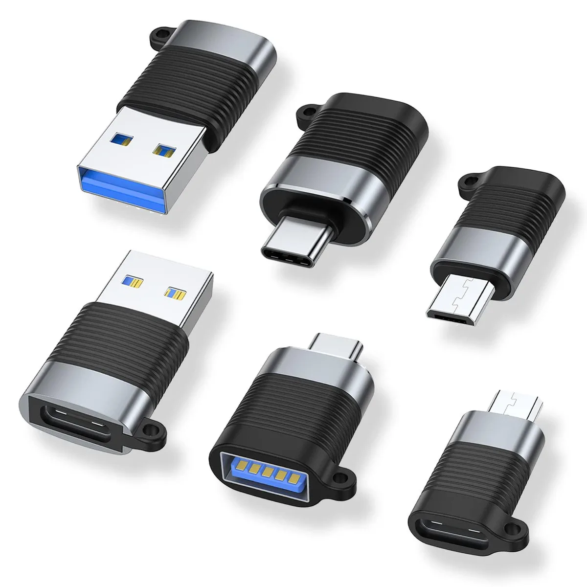 Six small USB adapters in space-grey aluminium and black plastic, two of each connector type