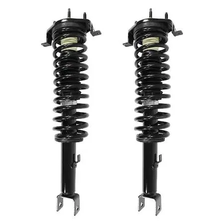 Two silver rear strut assemblies with coil springs and top mounts side by side