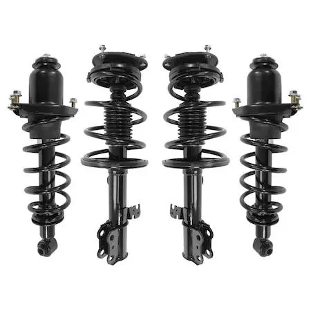 Four silver strut assemblies with black springs on a plain background