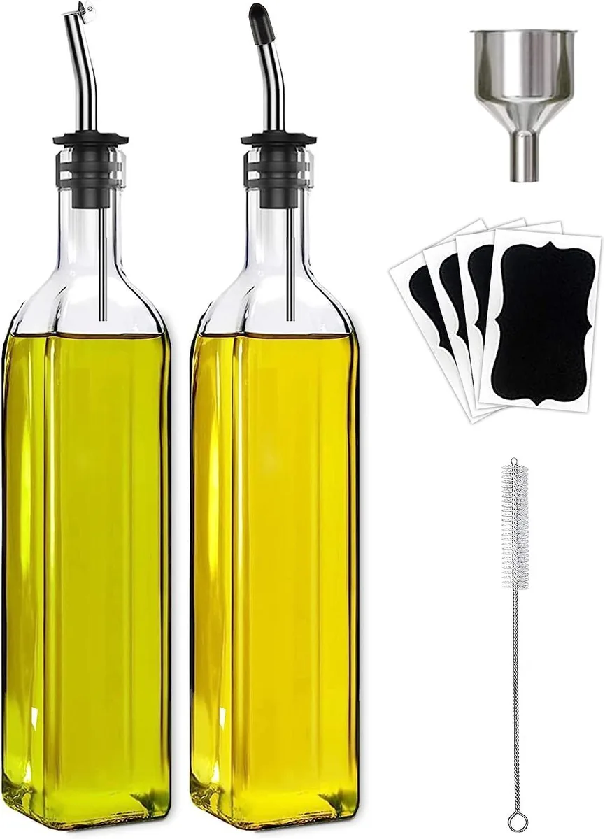 Two clear glass bottles with stainless steel pourers and caps, rectangular shape, 12 inches tall