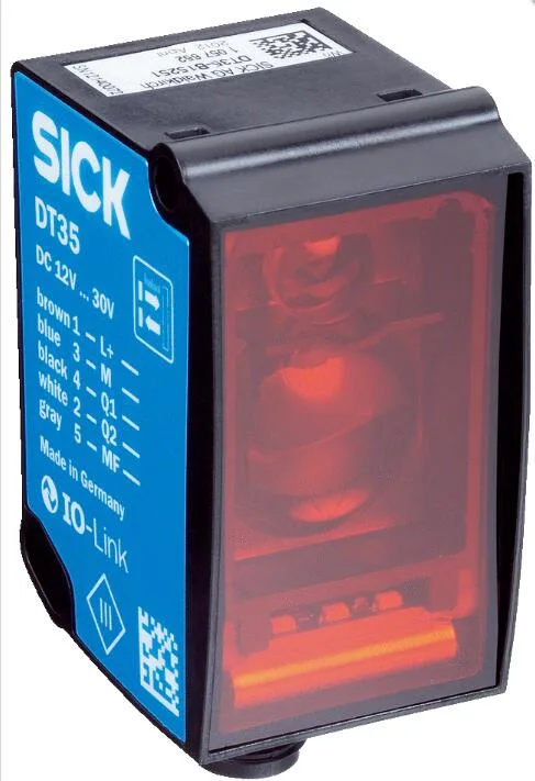 Rectangular plastic sensor housing with red laser aperture and male connector