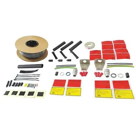 Black self-regulating heating cable kit on reel with connection accessories