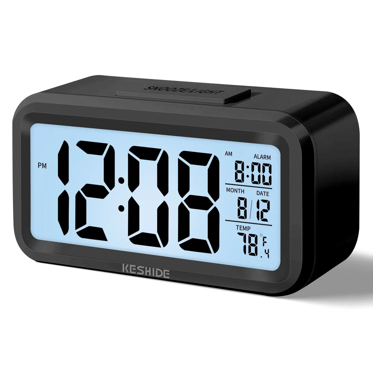 Black rectangular LCD alarm clock 6.7 by 1.5 by 3.0 inches