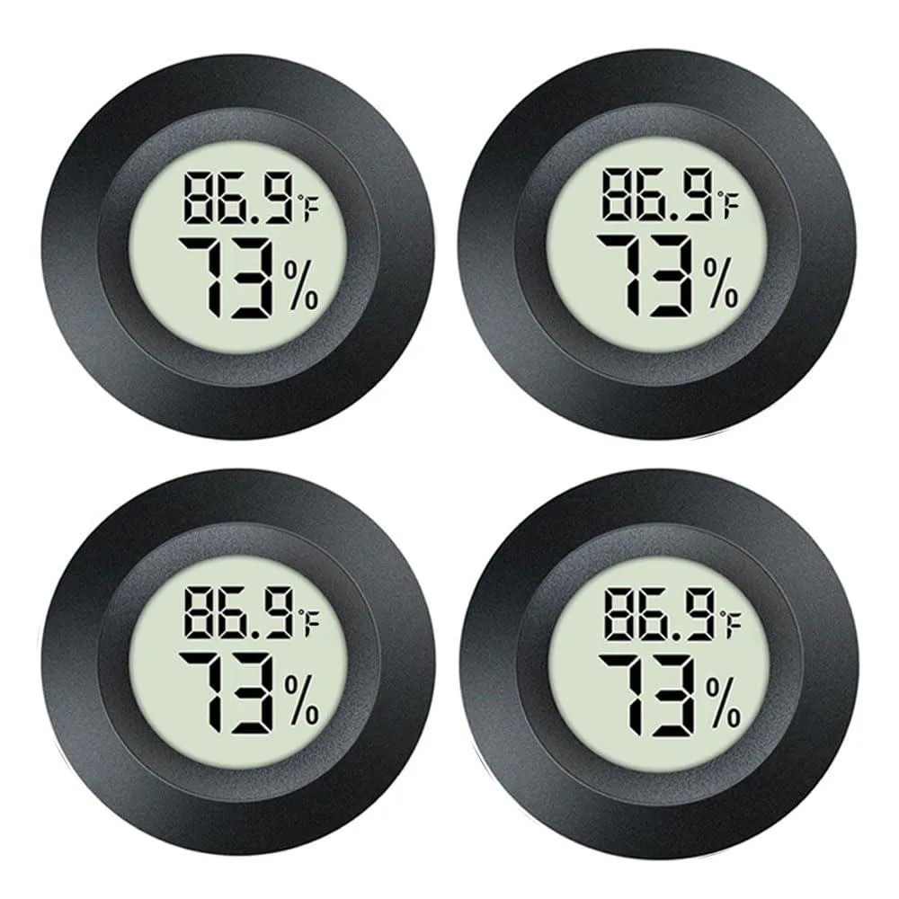 Four small black digital thermo-hygrometers with LCD screens and double-sided tape