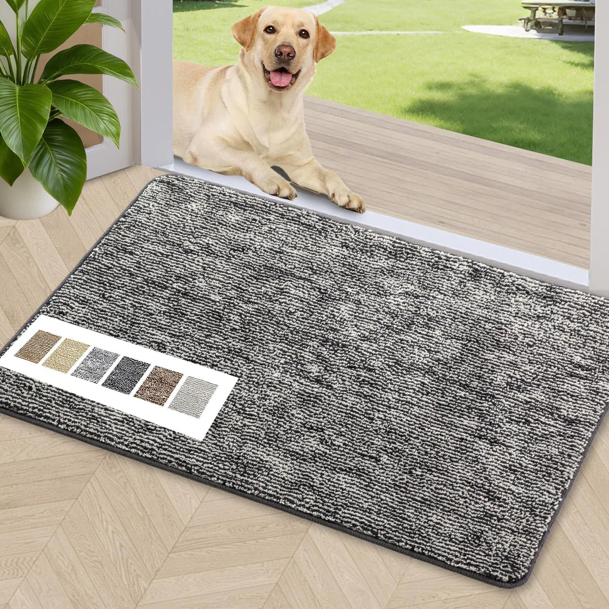 Black rectangular door mat, low-profile braided texture, rubber backing, 24 by 36 inches