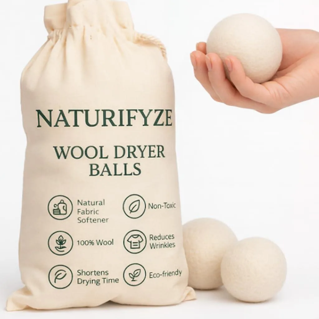 Six white wool dryer balls in a cotton bag