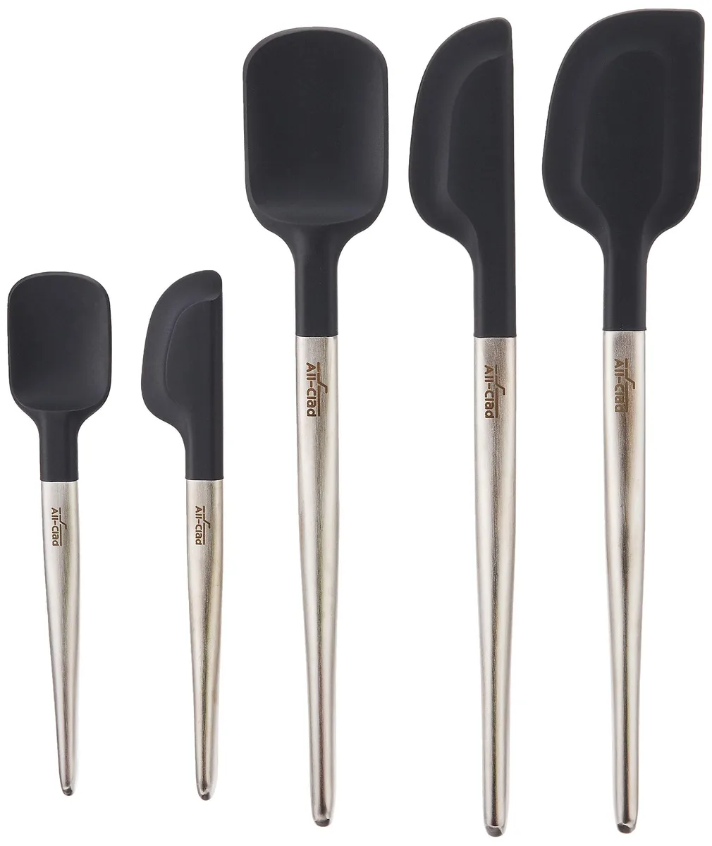 Five black silicone utensils with brushed steel handles