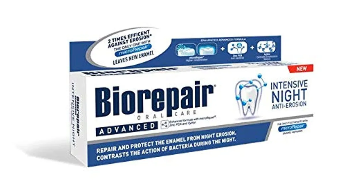 White 75ml toothpaste tube with blue and green accents standing upright