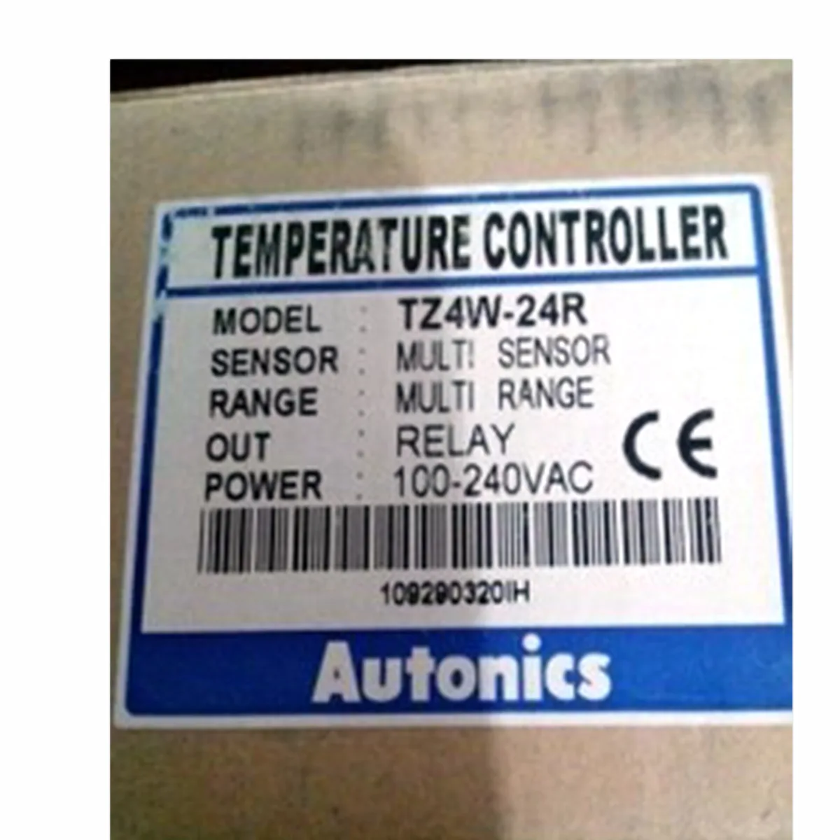 Red rectangular temperature controller with 4-digit LED display