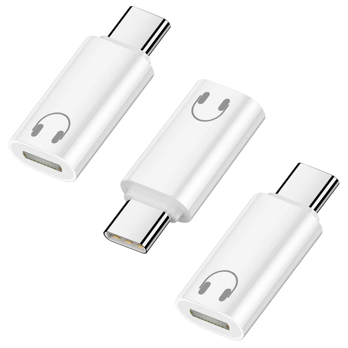 Three white USB-C to Lightning audio adapters, small plastic dongles
