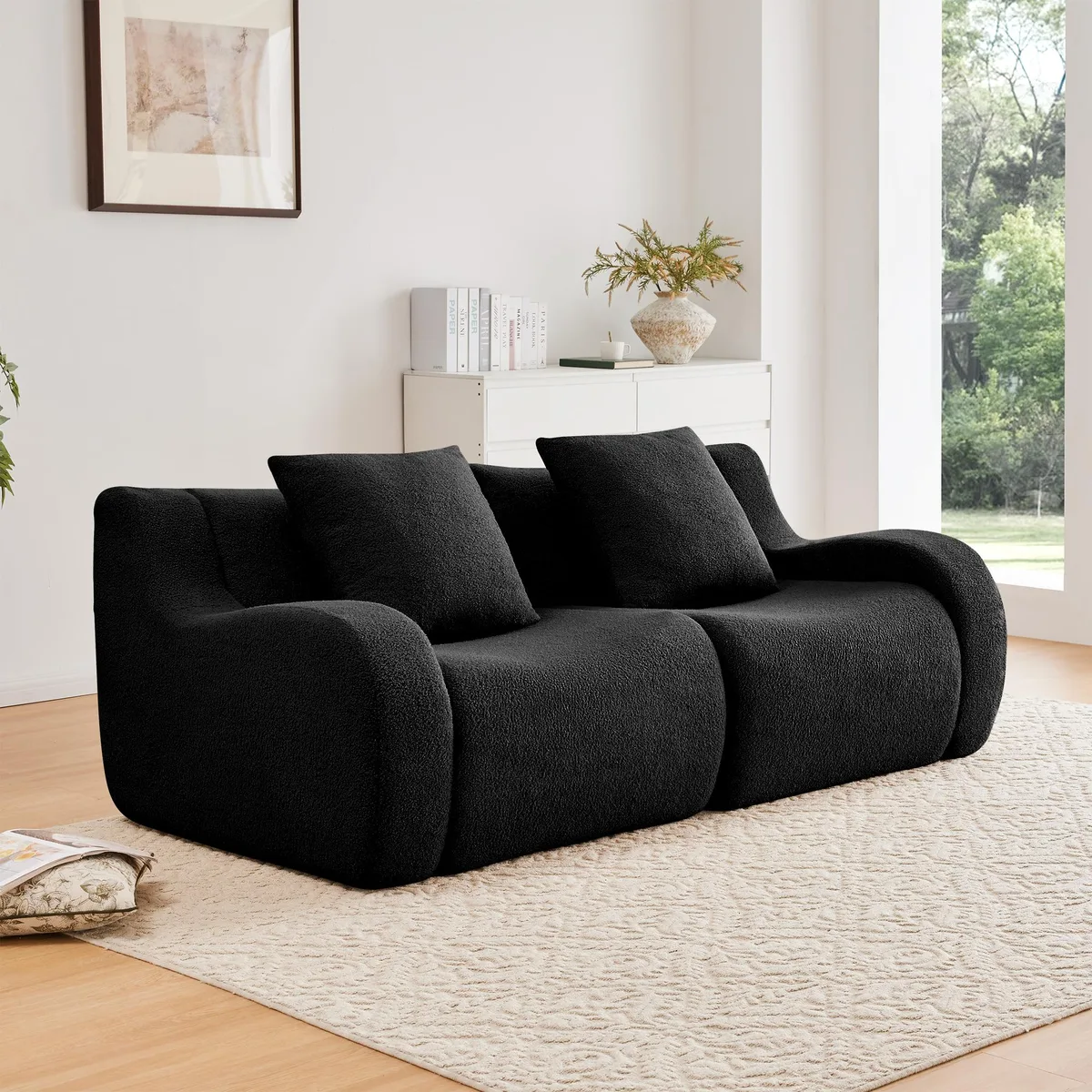 Black teddy fabric modular sofa with curved armrests and non-slip base