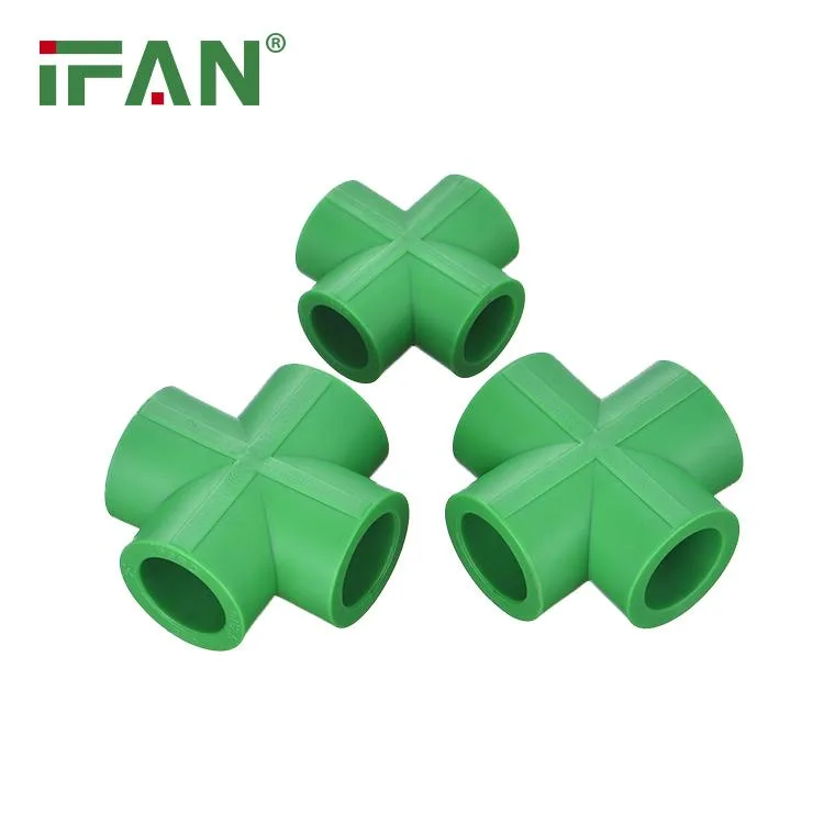 Green PPR plastic cross tee fitting with four 20mm socket ends