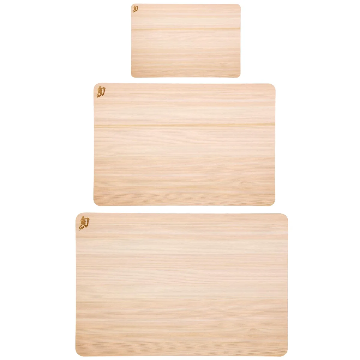 Three light wooden cutting boards in small medium large sizes rectangular shape smooth finish visible grain