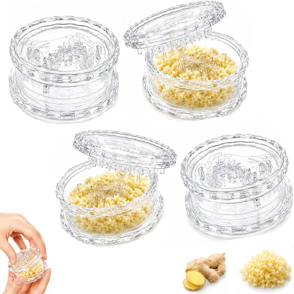 Four clear plastic garlic grinders with rotary lids and textured bases