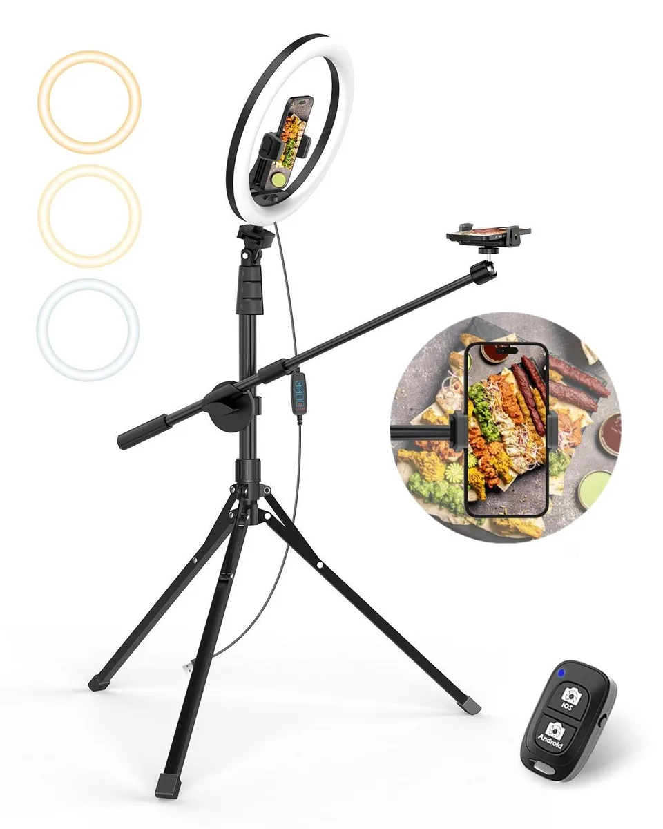 A 12 inch ring light on a 62 inch silver tripod with phone holder