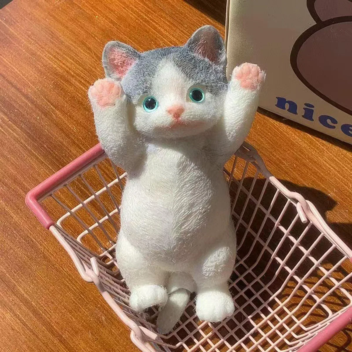 Soft gradient-coloured cat squishy toy with fuzzy textured surface