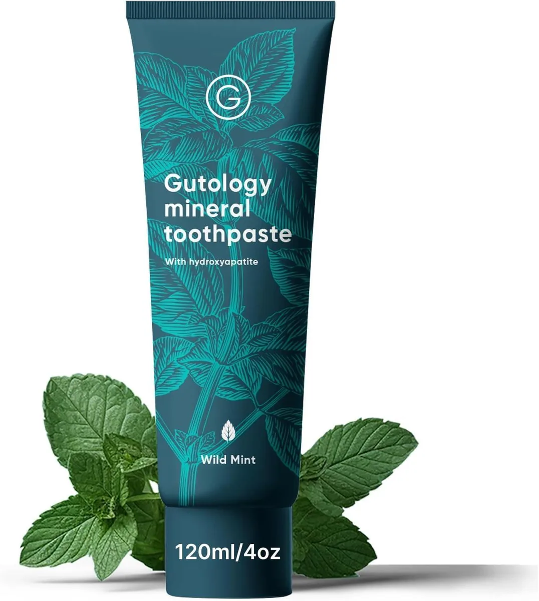 White flip-cap toothpaste tube standing upright on a plain surface
