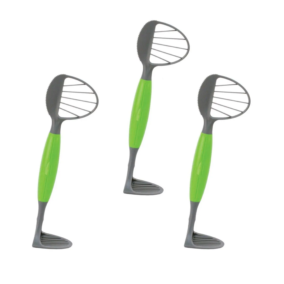 Three green plastic avocado tools on a light background