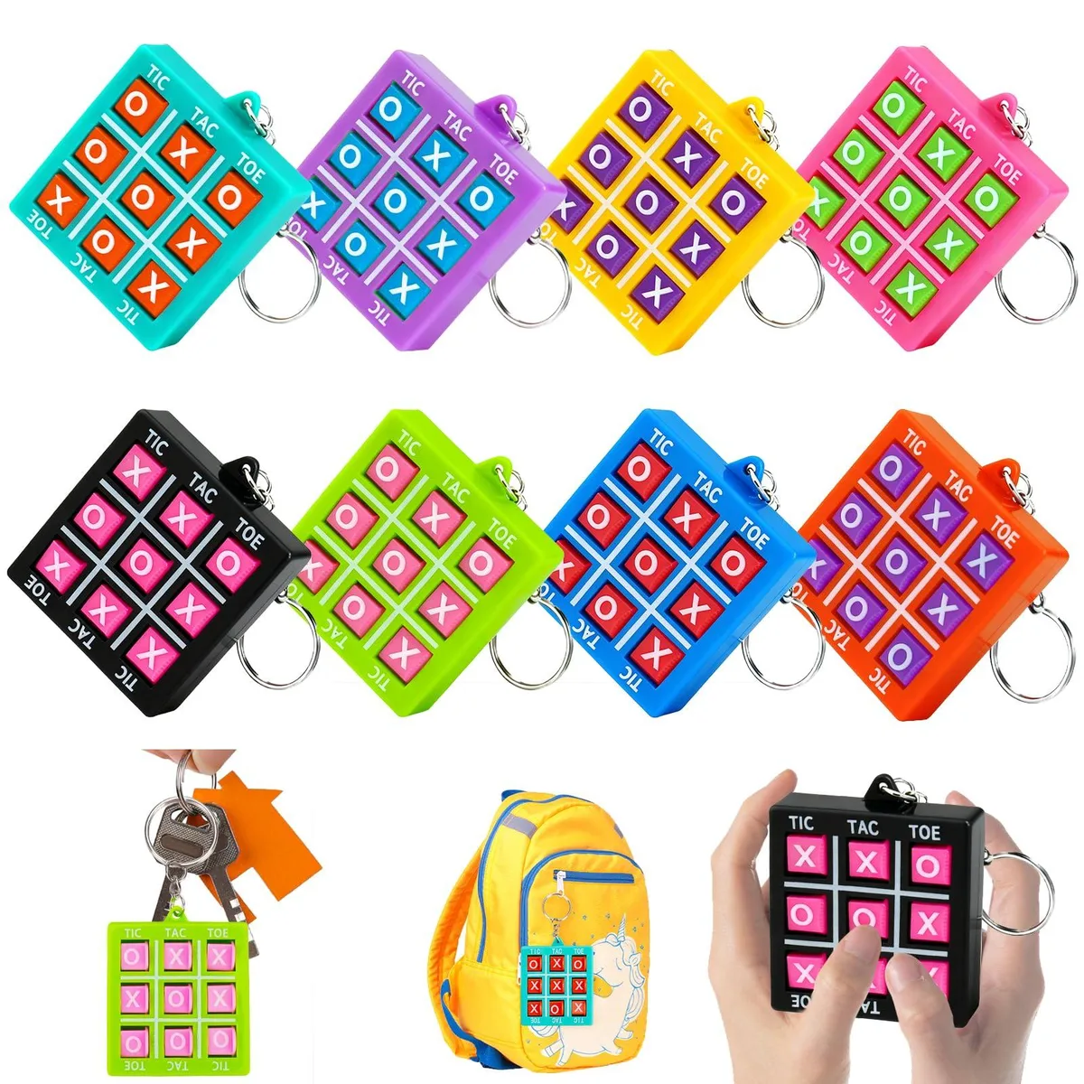 Sixteen multicoloured tic-tac-toe keychains on a flat surface