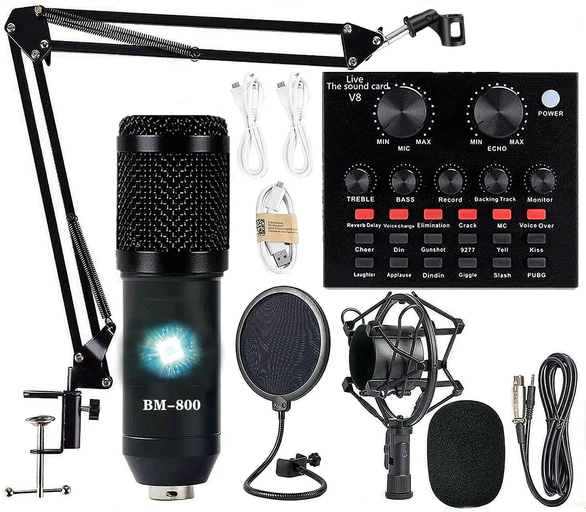 Black microphone with scissor arm stand, shock mount, pop filter, and sound card unit on desk