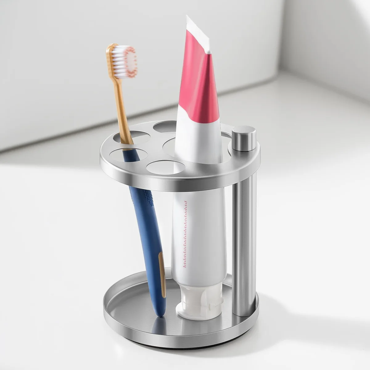 Brushed silver stainless steel toothbrush holder with slotted organizer and weighted base