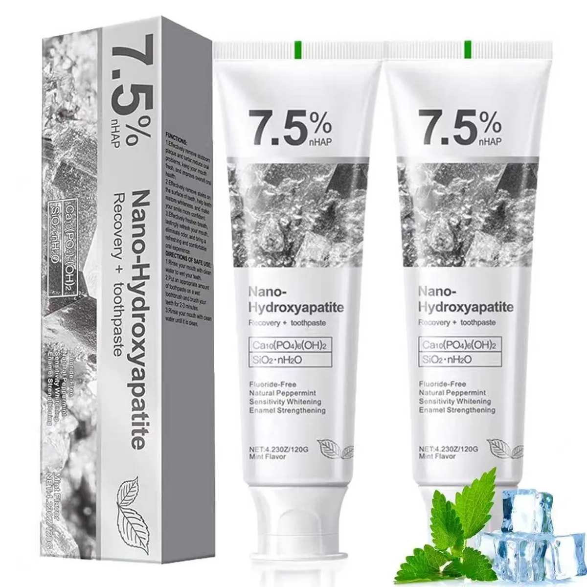 Two small white tubes of probiotic toothpaste side by side