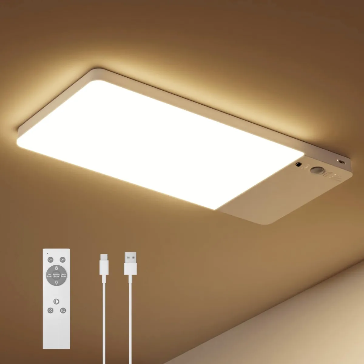 White rectangular LED ceiling light with clear prismatic lens and magnetic base, shown with remote control