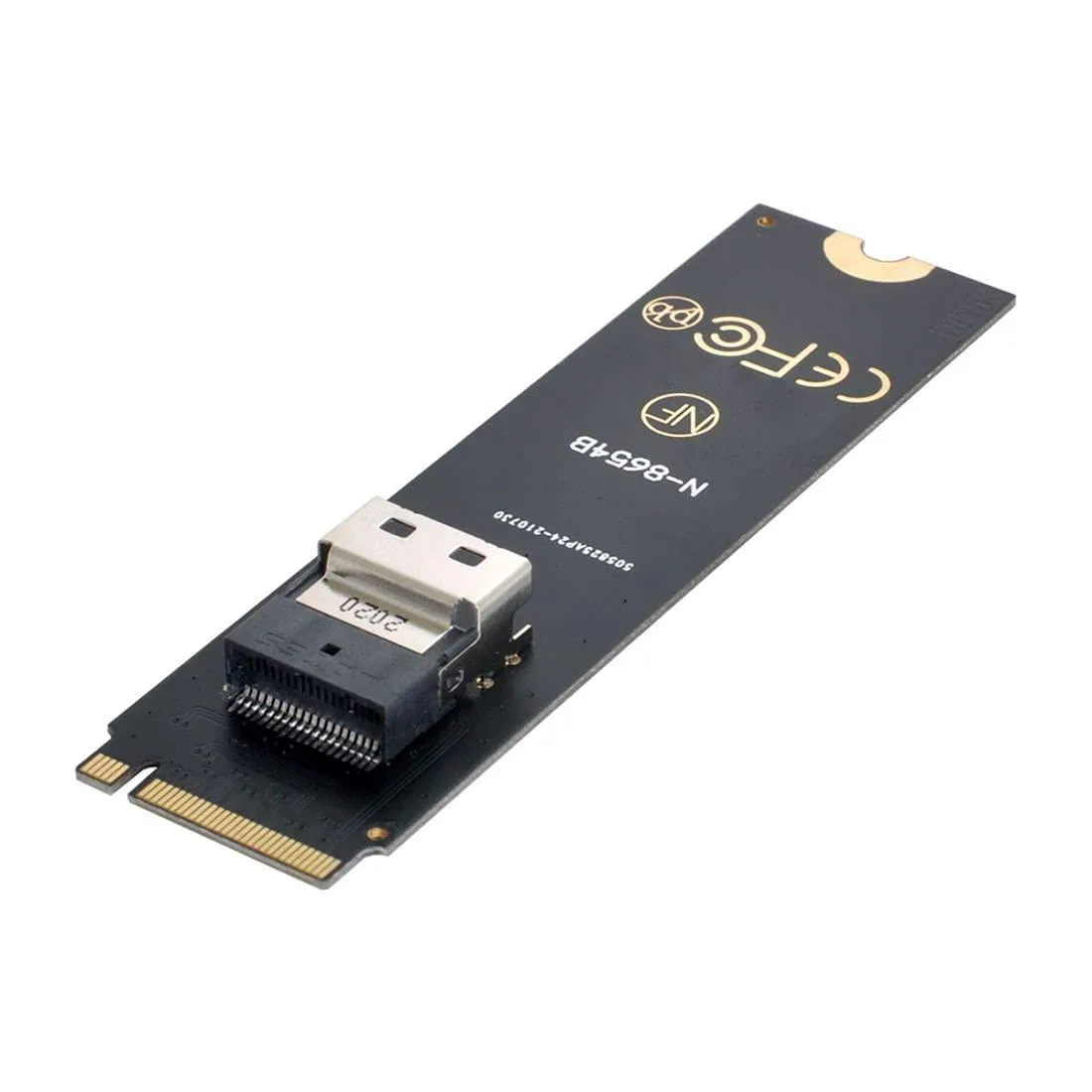 Small green circuit board with gold edge connector and M-key slot