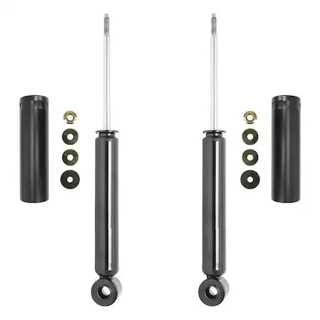 A pair of silver rear shock absorbers in a box